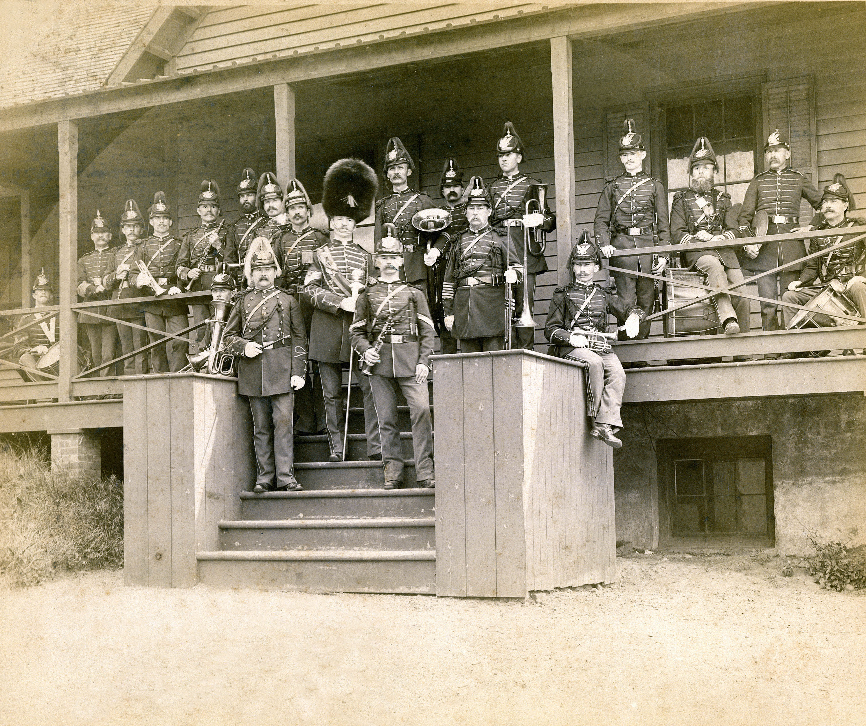 Band on steps of photo lab building